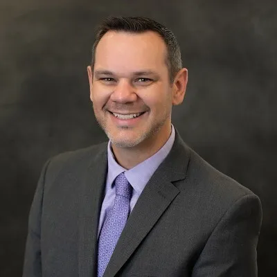 Headshot of Travis Gregg